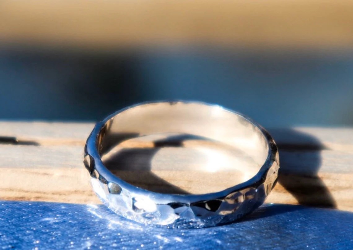 Handcrafted hammered sterling silver ring